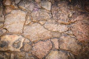 Roca pared textura antecedentes - con piedras de diferente tamaños 2 foto