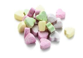 rosado y púrpura corazón conformado dulces. San Valentín día antecedentes. 5 5 foto