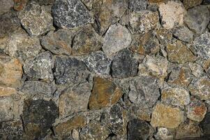 A wall constructed from genuine rock materials 2 photo