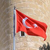 Turkish flag on the background of a brick wall of the mosque 3 photo
