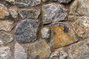 Texture of a stone wall. Old castle stone wall texture background.1 photo