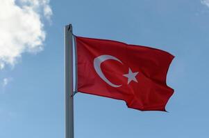 Turkey flag against blue sky 3 photo