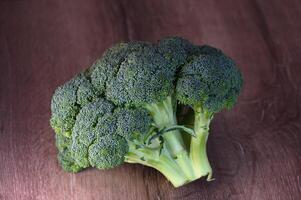 broccoli on a wooden table in the kitchen 5 photo