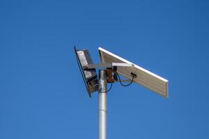 solar-powered street lighting floodlight against the sky 1 photo