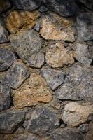 Stone wall texture. Decorative uneven cracked real stone wall surface. 3 photo