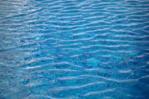 surface of blue swimming pool,background of water in swimming pool.1 photo