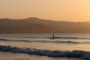 man doing SUP boarding on the Mediterranean Sea 3 photo