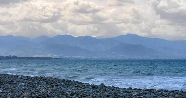 view of the Mediterranean sea and mountains in winter 2 photo