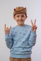 portrait of a boy in a cowboy hat on a white background 3 photo