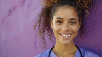 Smiling Female Nurse Standing Near Purple Wall photo