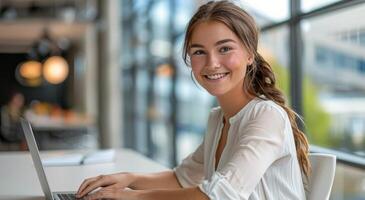 Woman Sitting in Front of Laptop Computer photo