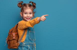 Young Girl With Braids Points to the Side While Wearing a Backpack photo