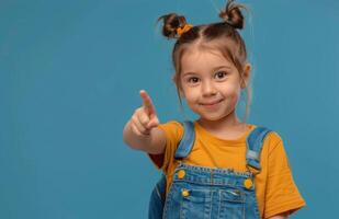 Young Girl With Braids Points to the Side While Wearing a Backpack photo