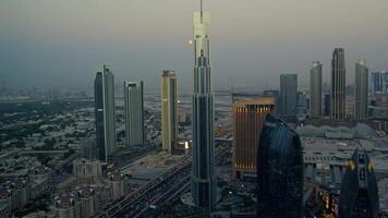 Rich Arabs Build Skyscrapers In Dubai At Evening, Aerial video