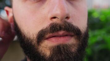 Mouth And Full Beard Of A Boy Outside video