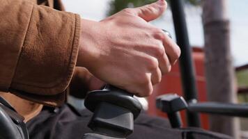 Hands Of A Worker Maneuvering Levers Of A Bulldozer video