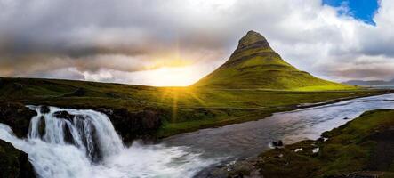 panoramic view of kirkjufell mountain and waterfall photo