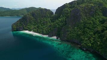 island in the Philippines in the ocean with a beach video