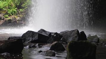 cave waterfall close up inside slow motion video