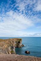 landscape of the rocky and jagged coastline photo