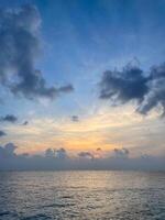 Maldivian sunrise at Indian Ocean, vertical photo