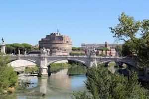 Rome, Italy - September 13 2022 View of Vittorio Emanuele II Bridge and Sant'Angelo Castel or Castello Angelo in Rome, Italy photo