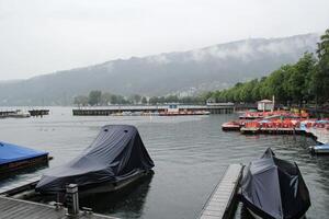 Lake Constance and Boats in Bregenz at rain photo