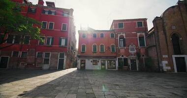 Cityscape of the streets of Venice, Italy. Beautiful urban landscape and architecture of colorful houses in a touristic and romantic city. High quality 4k footage video