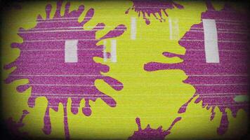 a yellow and purple pattern with splashes of paint video