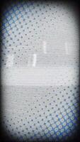 a close up of a blue and white pattern video