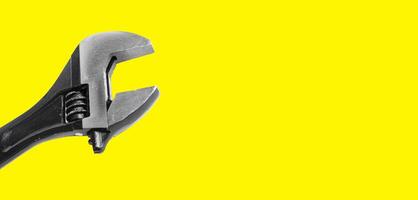 Old wrench and spanner tools on empty banner with space for text. Dirty adjustable mechanical photo