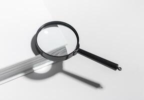 Exploration and research with magnifying glass. Single lens for discovery, search magnification photo
