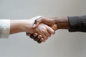 Concept of partnership and friendship shown through handshake between two people photo