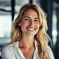 Portrait of a successful, confident businesswoman. Happy, attractive, mature lady with cheerful photo