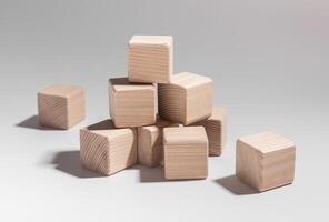 Wooden blocks stacked in educational play. Business and economy concepts learned through abstract photo