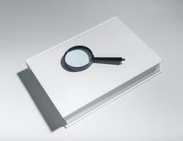 Financial research with magnifying glass, inspecting documents, books. Educational focus in business photo