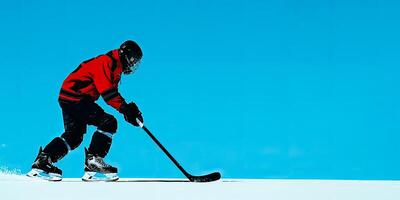 A hockey player in a black and red jersey is skating and holding a stick on the ice. Blue background with space for text on the right photo