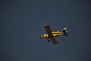 Air Tractor AT-802 Fire fighting Aircraft puts out a forest fire photo