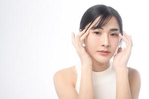 A portrait of young beautiful woman face with smooth healthy skin on white background , Skincare concept photo