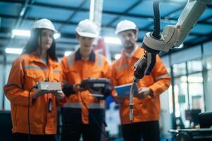 un grupo de robótica ingenieros trabajando con programación y manipulando robot mano, industrial robótica diseño, alto tecnología instalación, moderno máquina aprendiendo. masa producción automáticas. foto