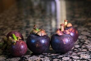 Queen of Fruits is a fruit that is very useful The benefits of mangosteen is not only the area we eat only Mangosteen has many benefits in treating the disease as well High quality photo exotic