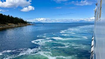 the ferry arrives from the coast of Canada to Vancouver Island, you can see the sea that seethes below on the side, the place of arrival, the Marine Station, now the cars will leave the ferry beauty photo