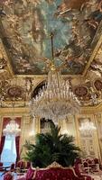 Chic halls in the Louvre since the time Statue of Aphrodite of Milos or Venus of Milo Napoleon with huge chandeliers and red armchairs 26.04.22 Paris France photo