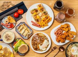 Assorted taiwan food club sandwich, french fries, hot dogs, Hamburger Egg Patty, corn soup, Carrot cake, Ham and egg muffin burger, beans, nuggets, korean fried chicken, Pot roasted pasta, top view photo