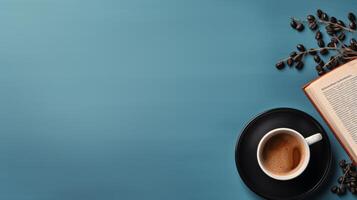 A Cup of Coffee and a Pen on a Blue Surface photo