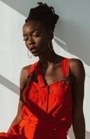 Woman in Orange Dress Posing for Picture photo