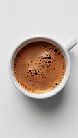 A Cup of Coffee on a White Table photo