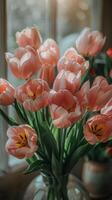 Pink Flowers in Vase on Window Sill photo