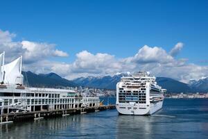 various recognizable places and attractions of Vancouver in Canada city center good weather clean downtown blue sky huge buildings skyscrapers many videos and photos of this topic British Columbia