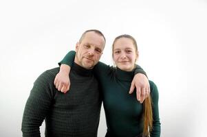 Two best friends hugging and smiling at the camera. How much more this friendship will last. Two are together since kindergarten and nothing could not split them, they are like brother and sister now. photo